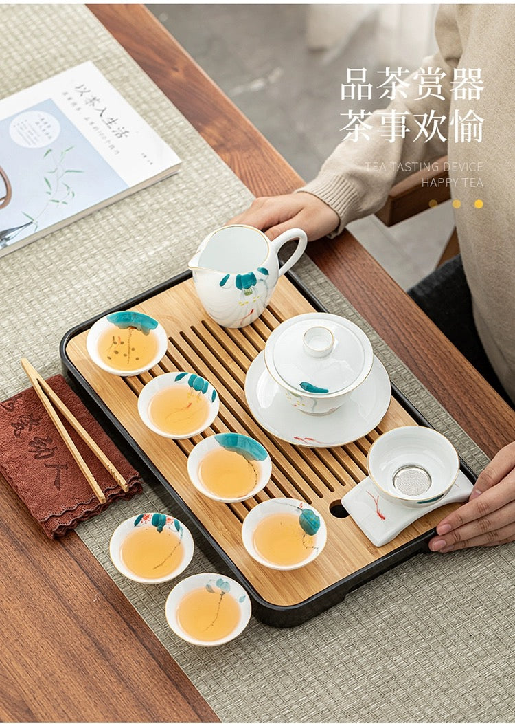 Portable china tea set with storage suitcase