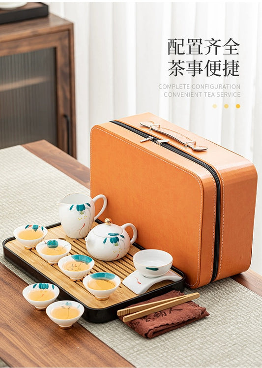Portable china tea set with storage suitcase